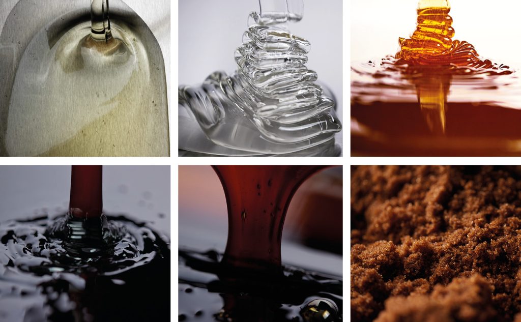This is a picture showing six sugar ingredients, including clear and golden syrups, black treacle and brown crystalline sugar.